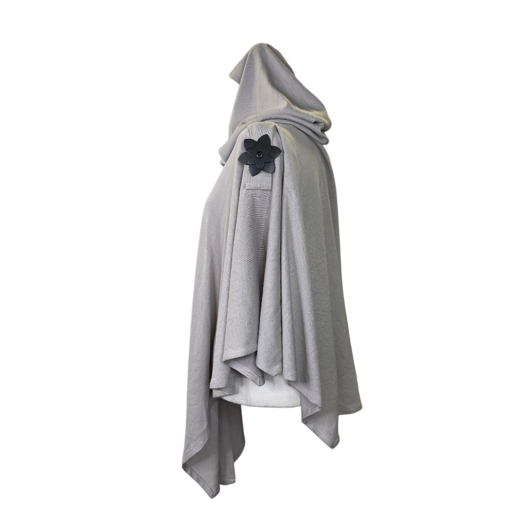 Anne Larochelle knit  with flower cut leather accent hooded poncho
